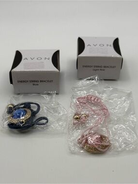 set of two Avon Energy String Bracelet - Blue and Light Pink